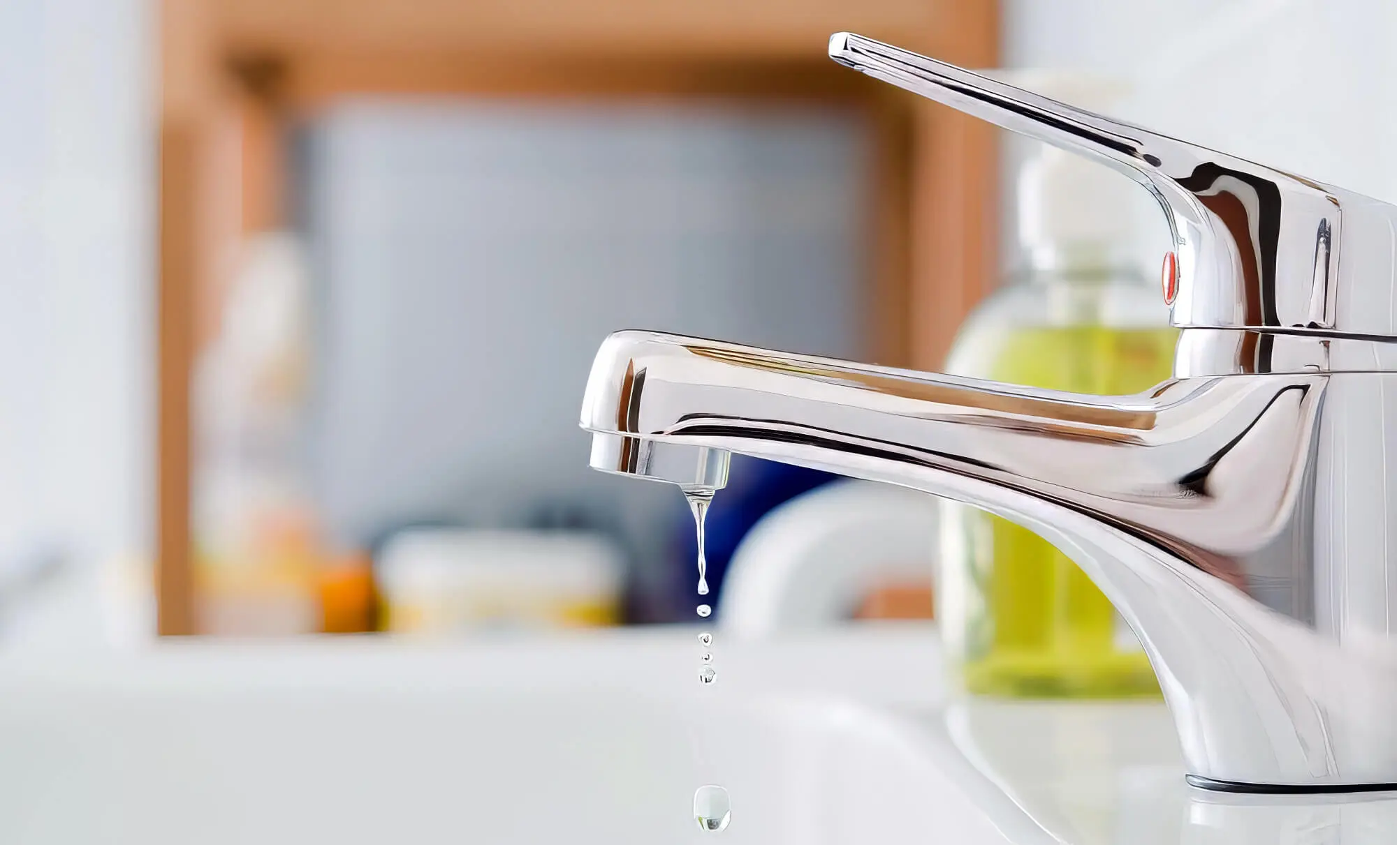 Chromed Mixer Tap Dripping Water