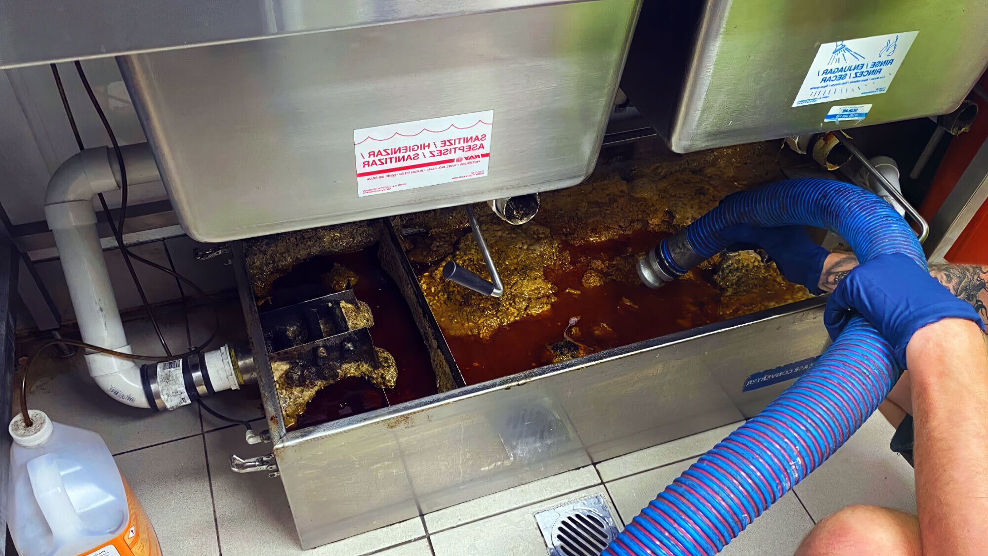 2024 06 Cleaning Large Stainless Steel Grease Trap Cleaning Large Stainless Steel Grease Trap