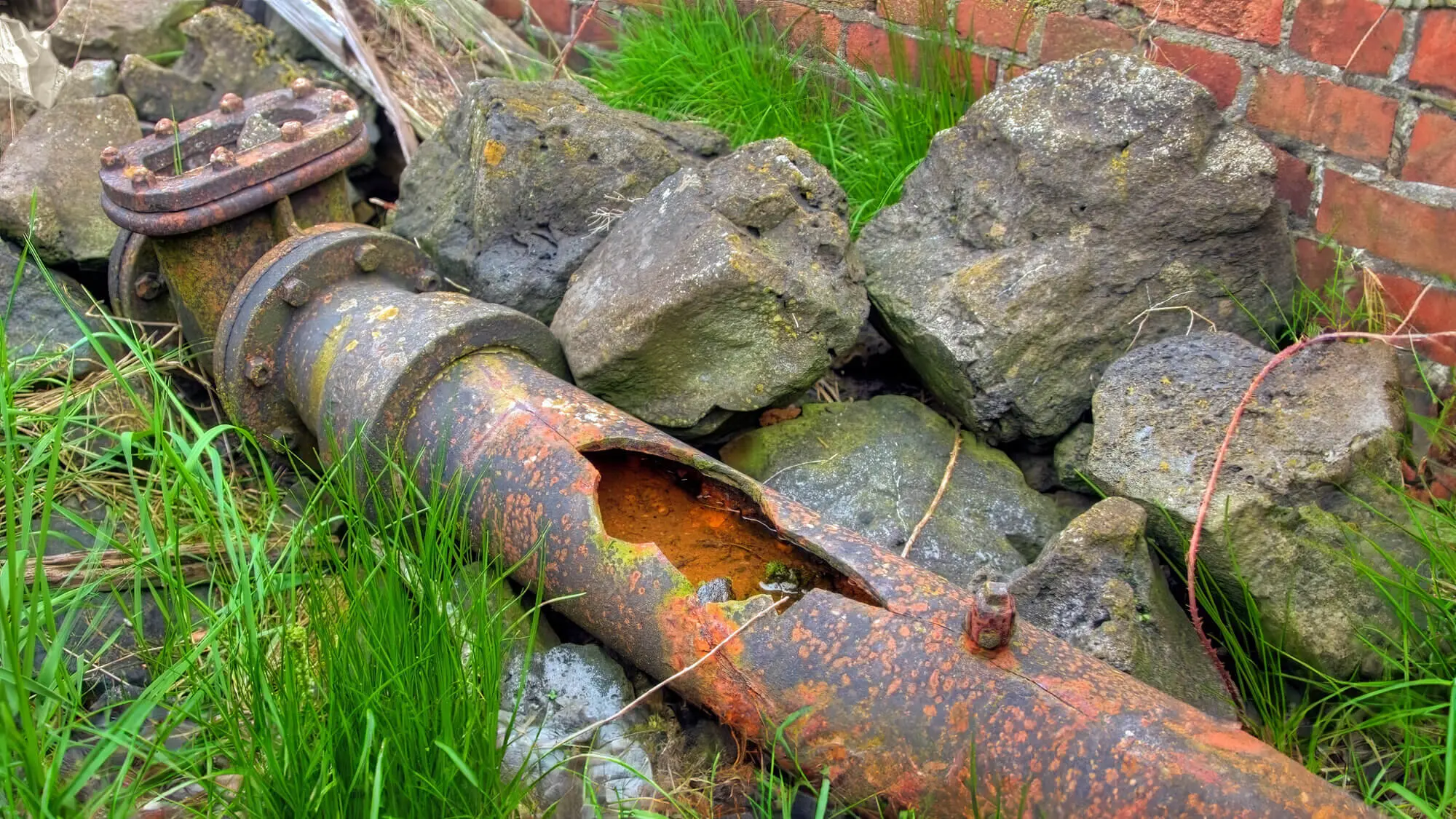 2024 07 Cast Iron Rusted Pipe In Ground Cast Iron Rusted Pipe Ground