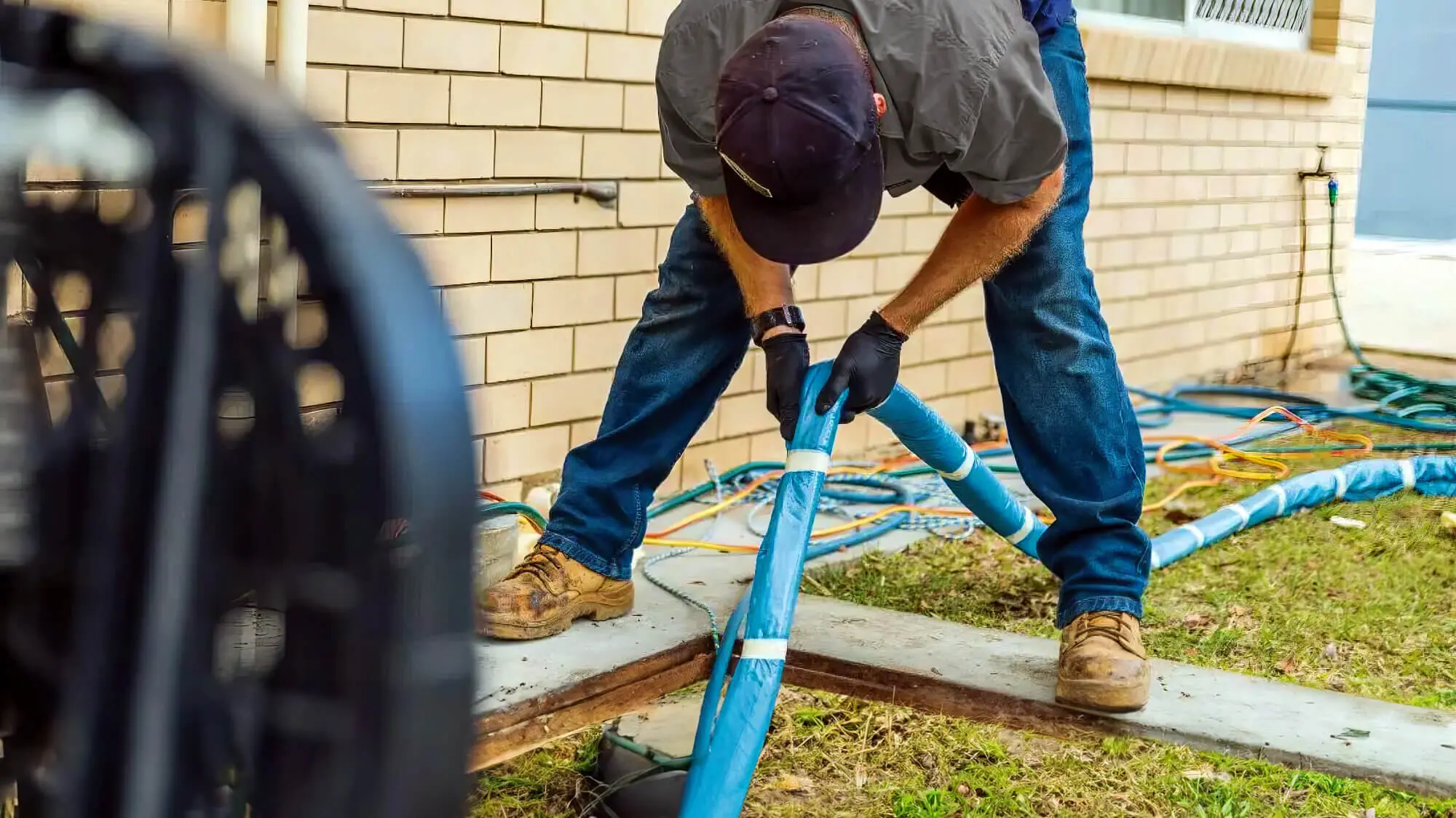 2024 07 Plumber Performing Pipe Relining Process Plumber Performing Pipe Relining Process