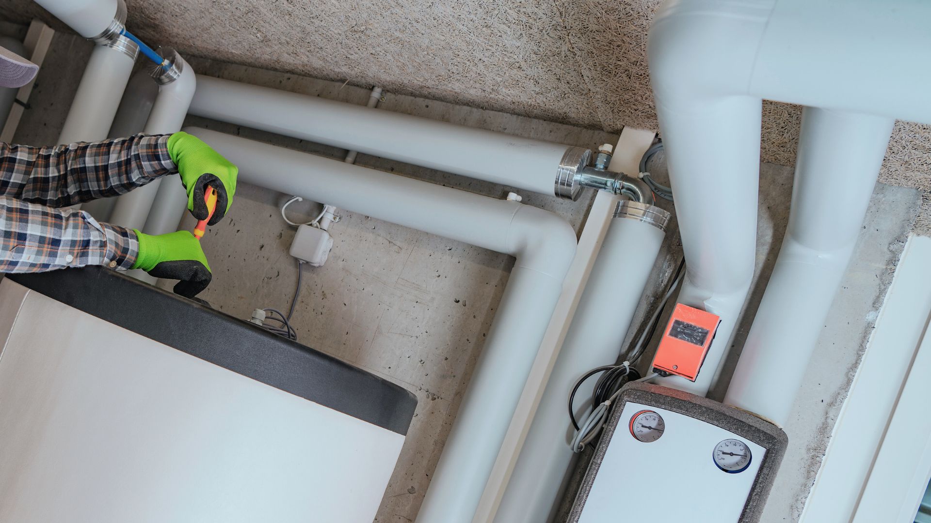 Plumber Repairing Hot Water System With Tools Plumbing Maintenance Sunshine Coast Plumber Repairing Hot Water System Tools Plumbing Maintenance Sunshine Coast