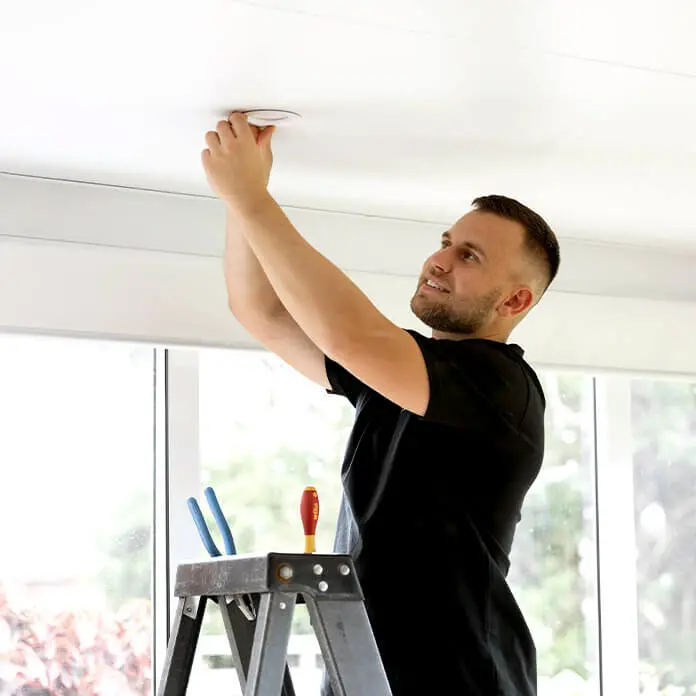 Daniel Installing Lighting