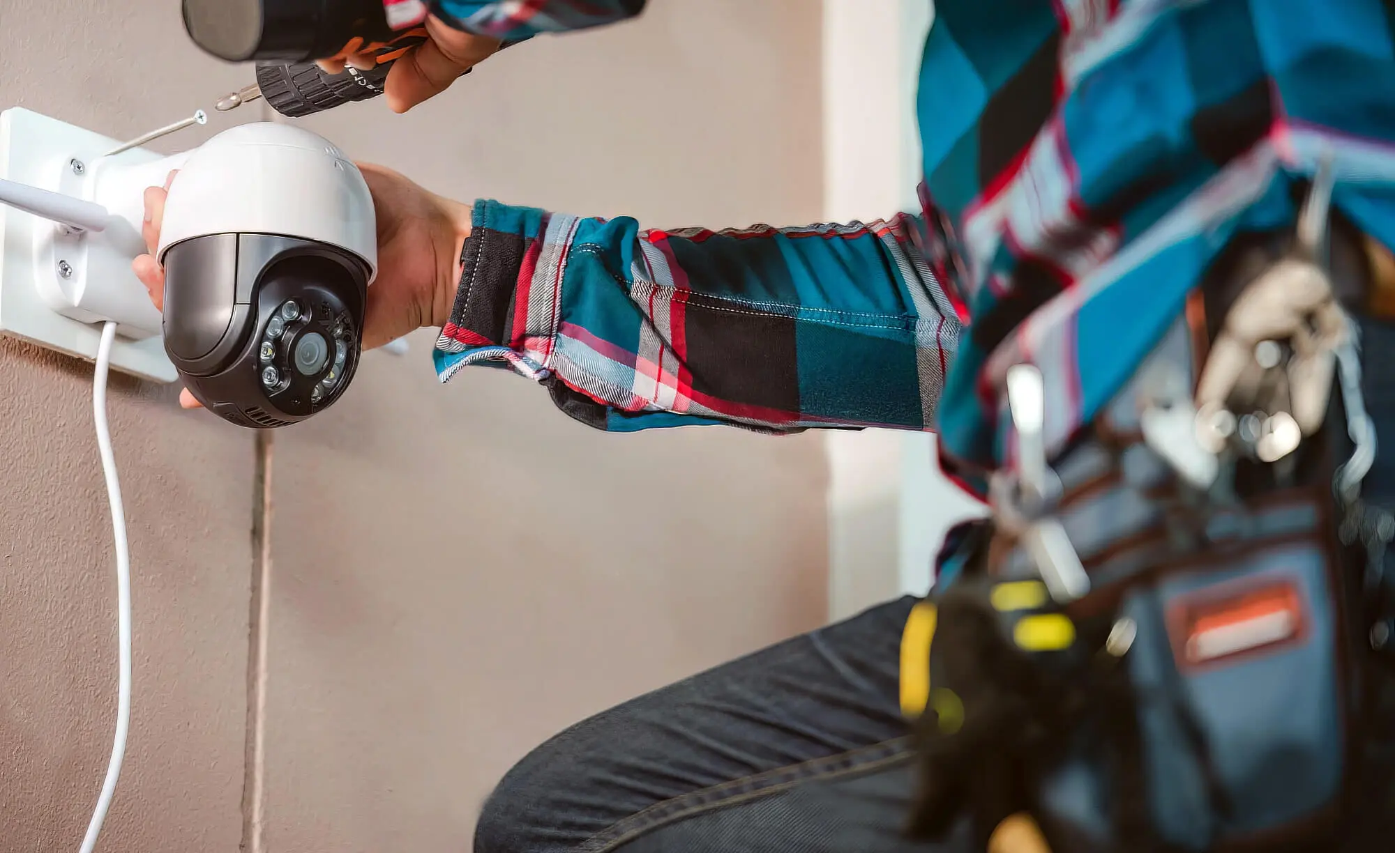 Electrician Installing Cctv Camera
