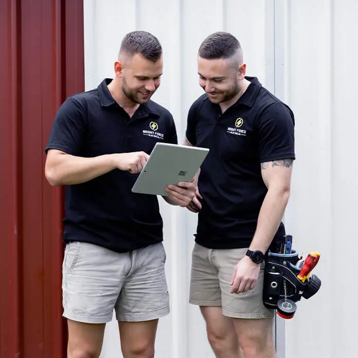 Electricians Discussing Solutions