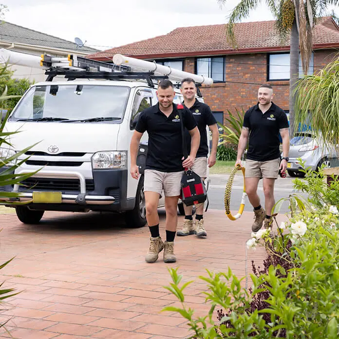 Team Walking Customer Driveway
