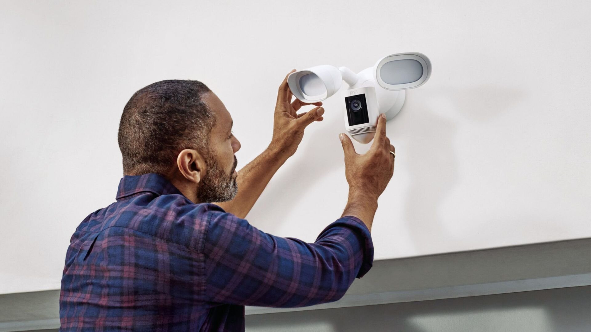 Person Installing Camera Security