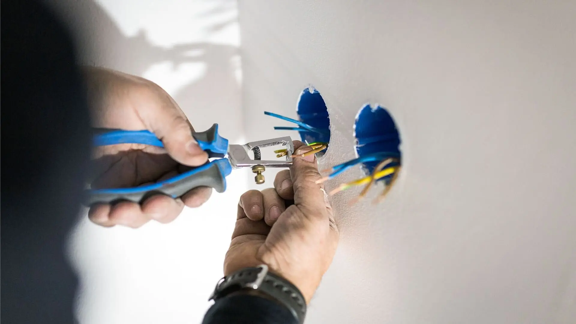 Electrician Installing Data Points