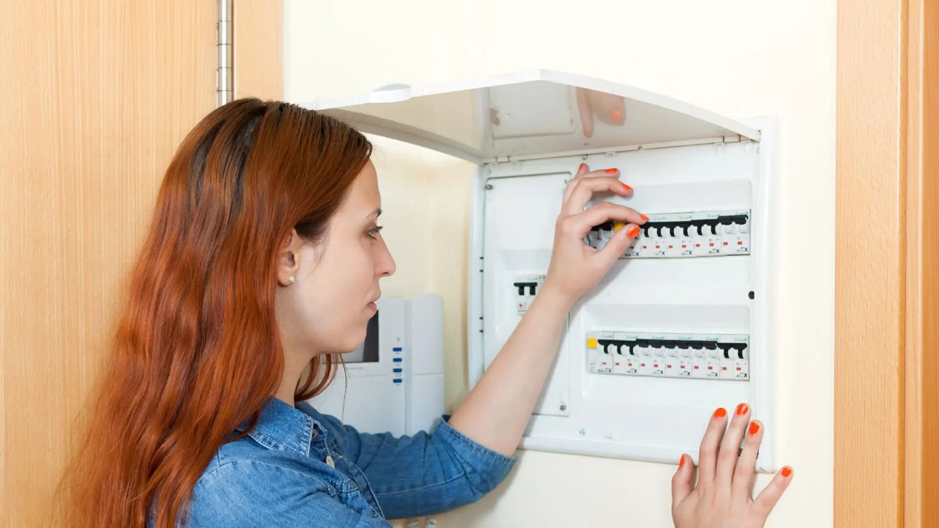 Woman Switching Circuit Breaker