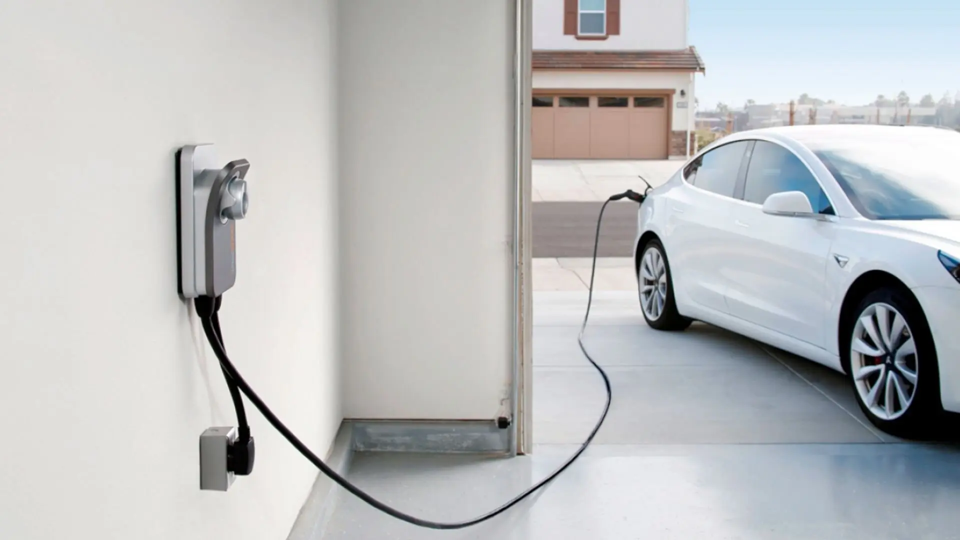 Charging White Tesla