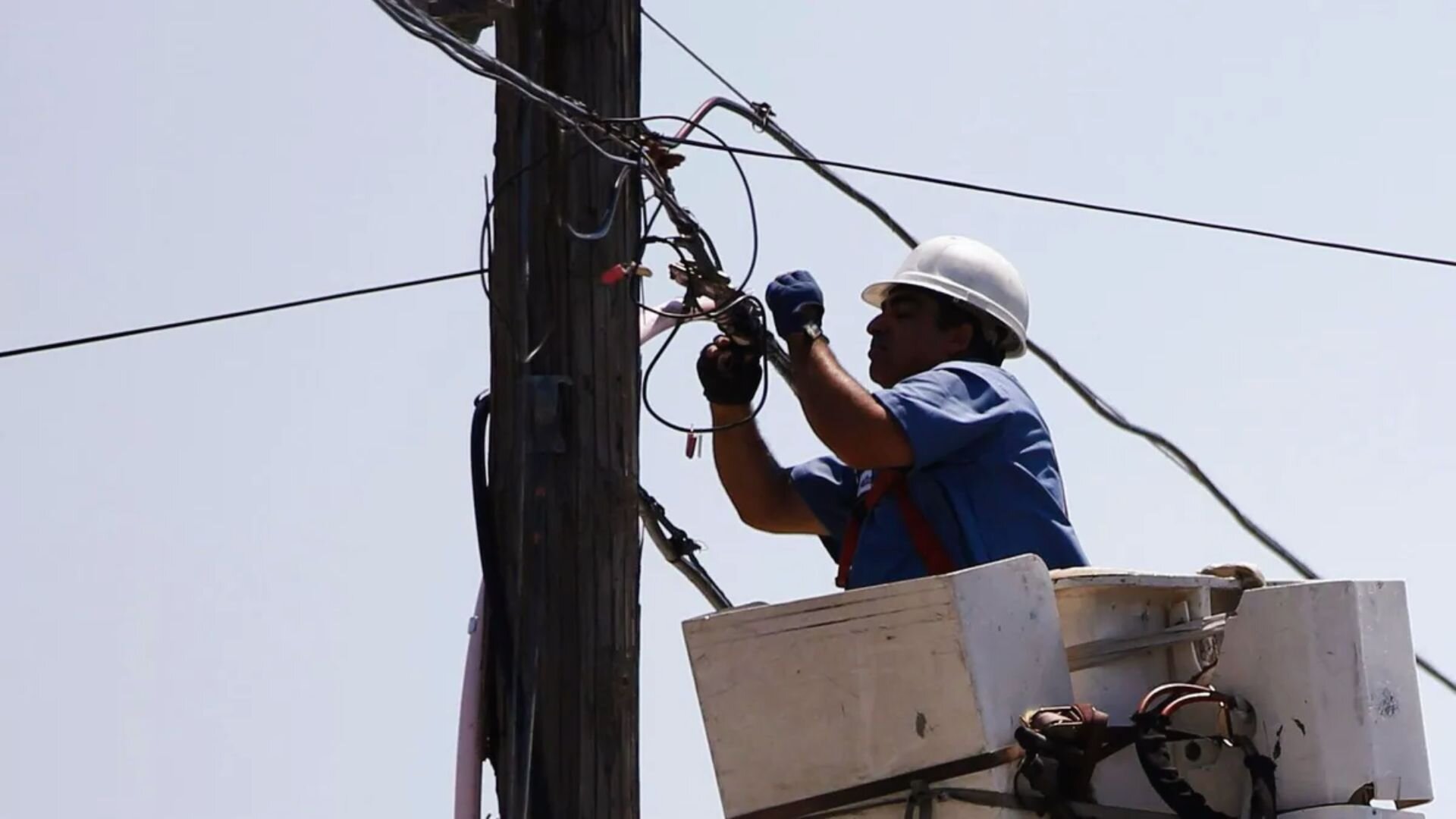 Man Fixing Main Electrical Line