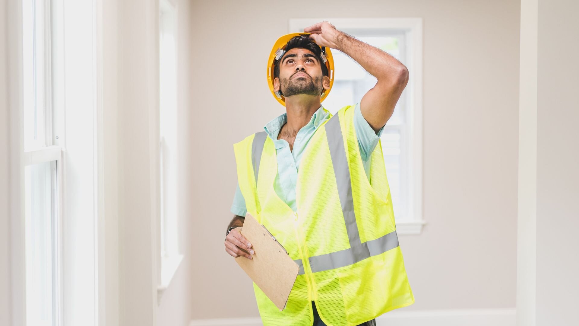 Electrician Undertaking Home Electrical Inspection