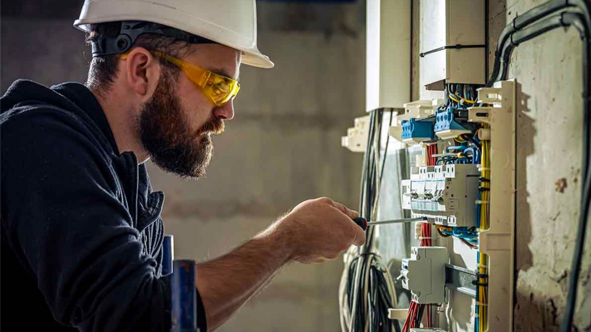 2023 08 Man Wearing Goggles Hat Switchboard Man Wearing Goggles Hat Switchboard