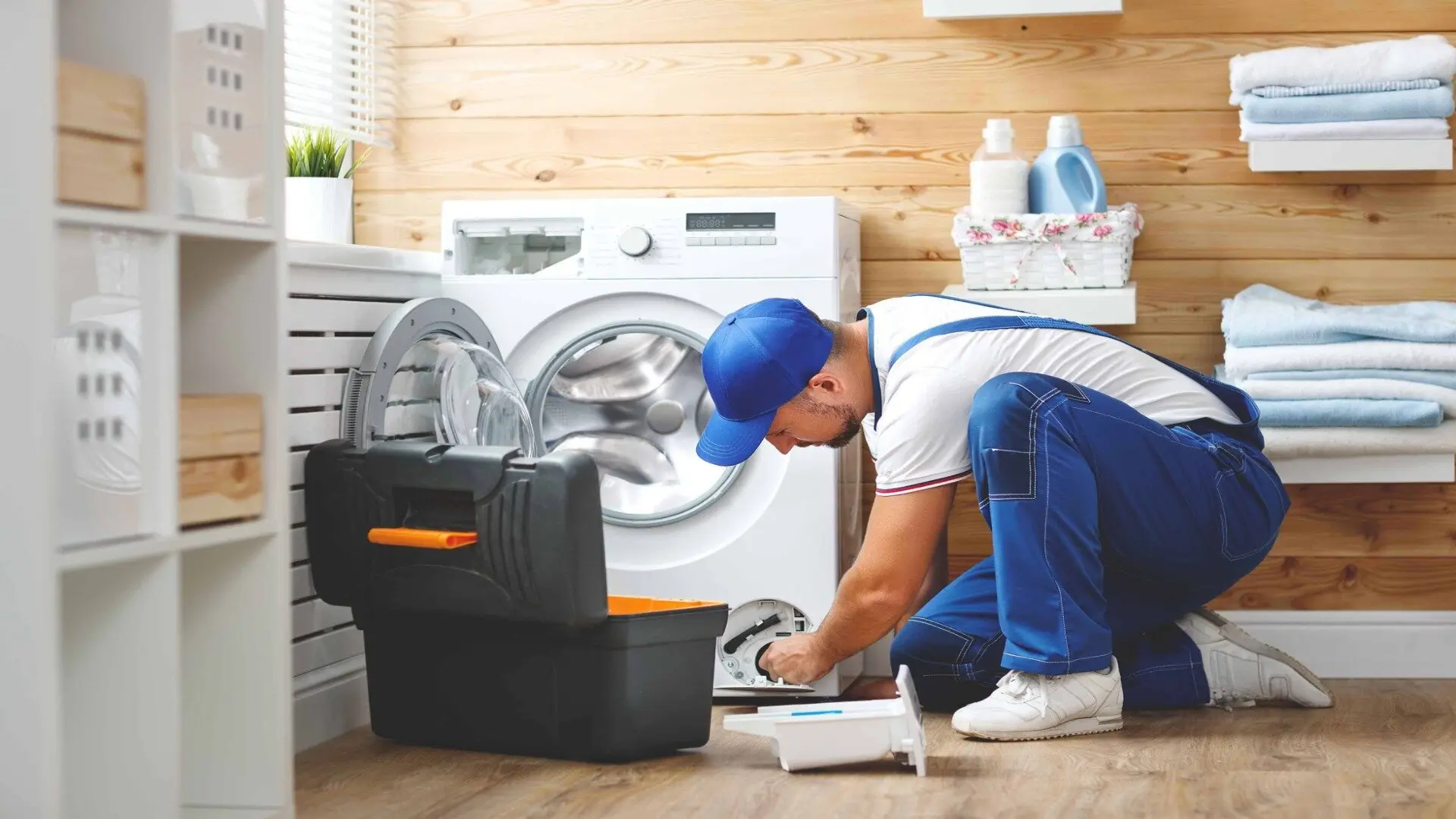 2023 11 Guy Fixing Washing Machine Guy Fixing Washing Machine