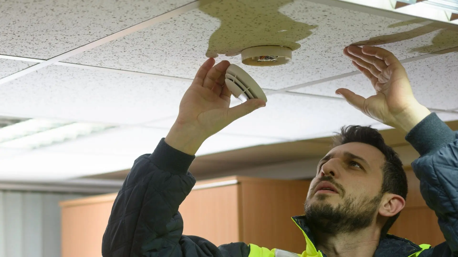 2024 03 Electrician Looking At Alarm Electrician Alarm