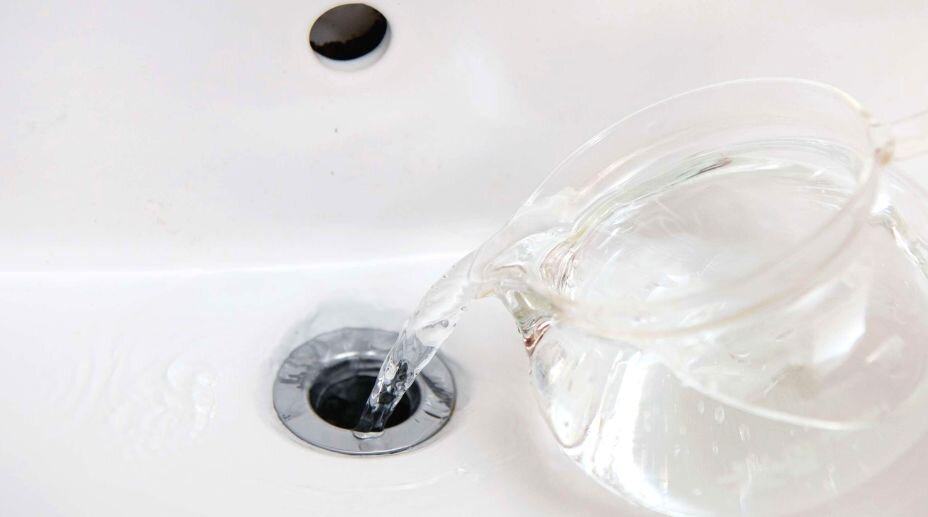 Pouring Hot Water Blocked Drain