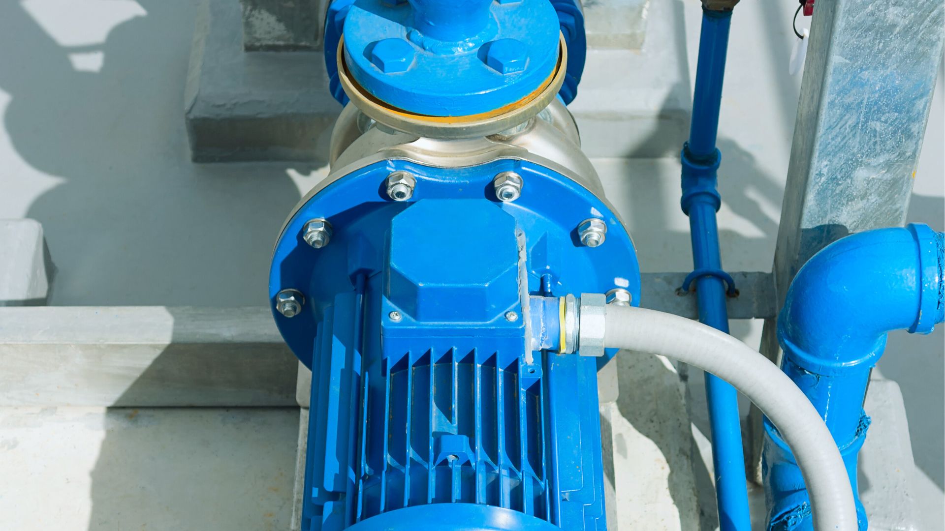 Blue Water Pump Installed Connected Pipes