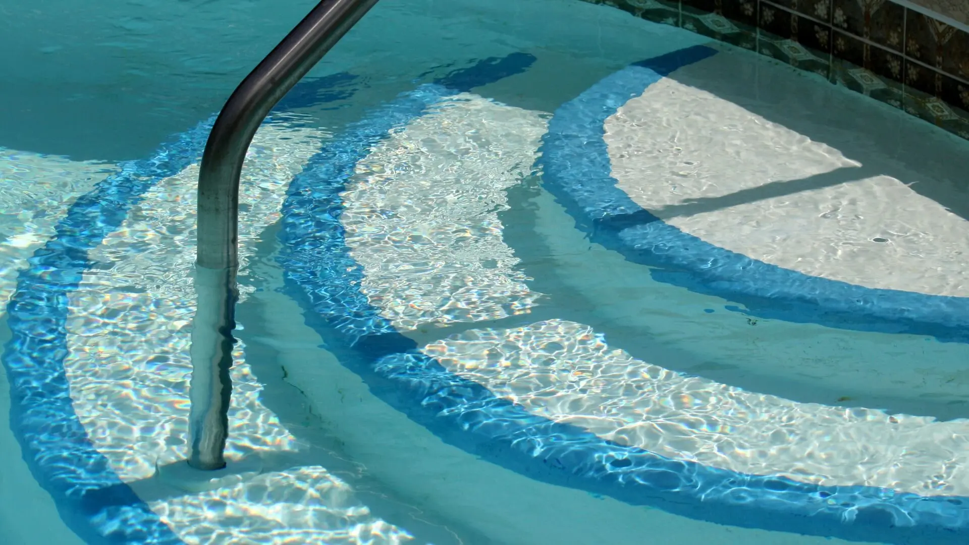 Designing Safe Pool Access: Steps and Ladders ‐ The Pool Co