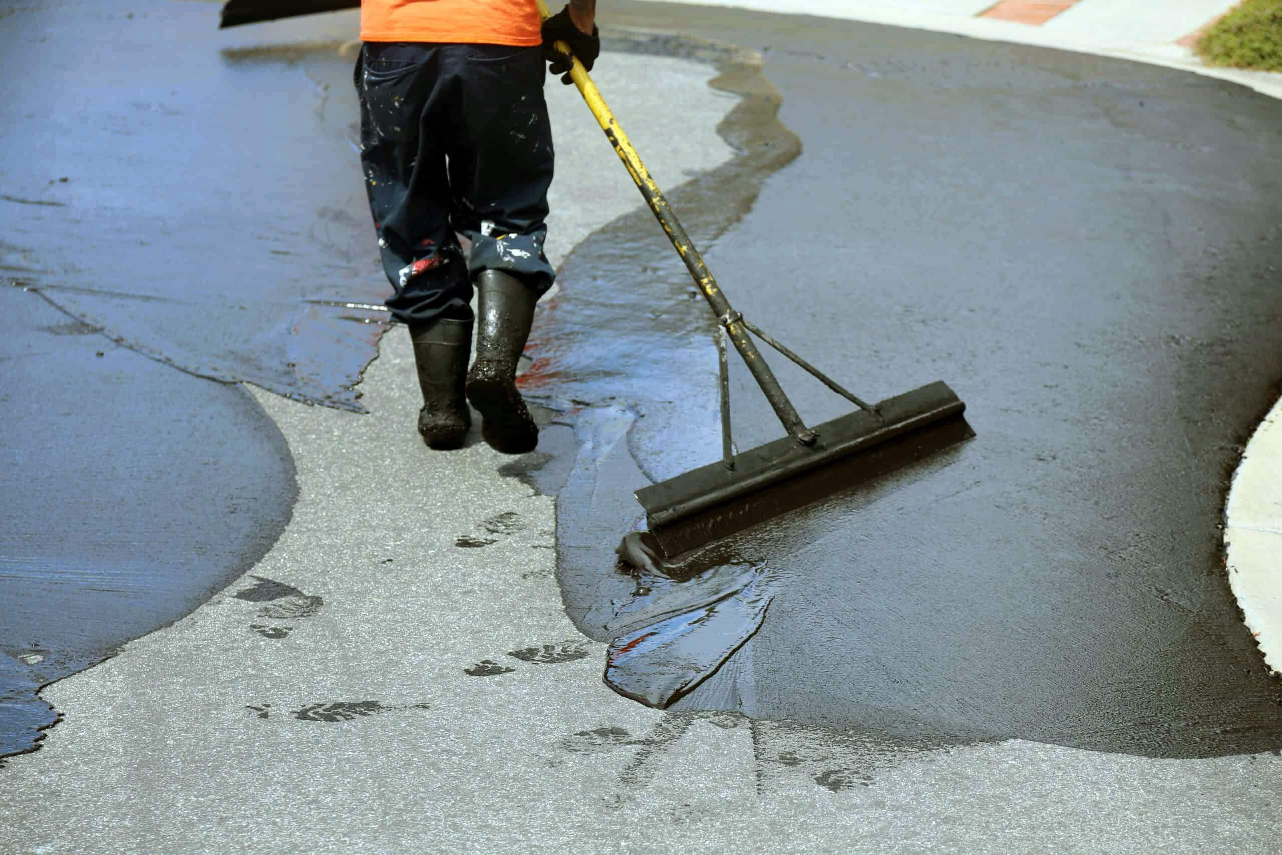 Spreading Driveway Coating Spreading Driveway Coating