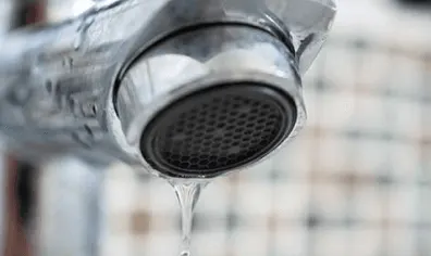 close up faucet with water drop c6303fa2c5