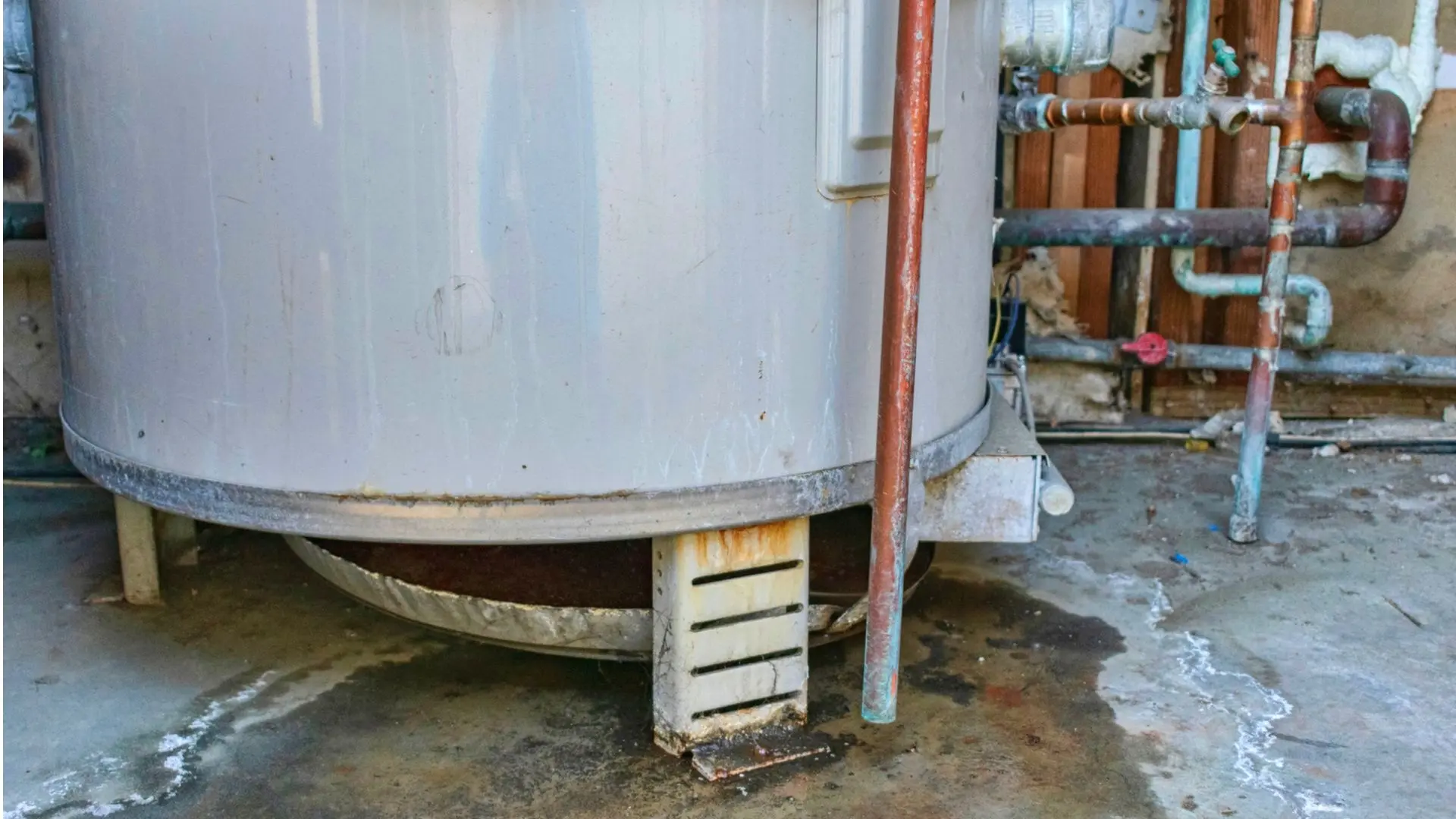 Corroded Hot Water System Outside On Concrete Corroded Hot Water System Concrete