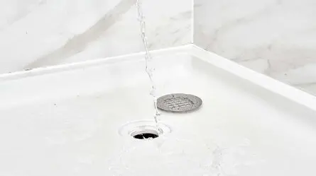 Removing Calcium Build-Up From Your Shower Drain Removing Calcium Build-Up From Your Shower Drain