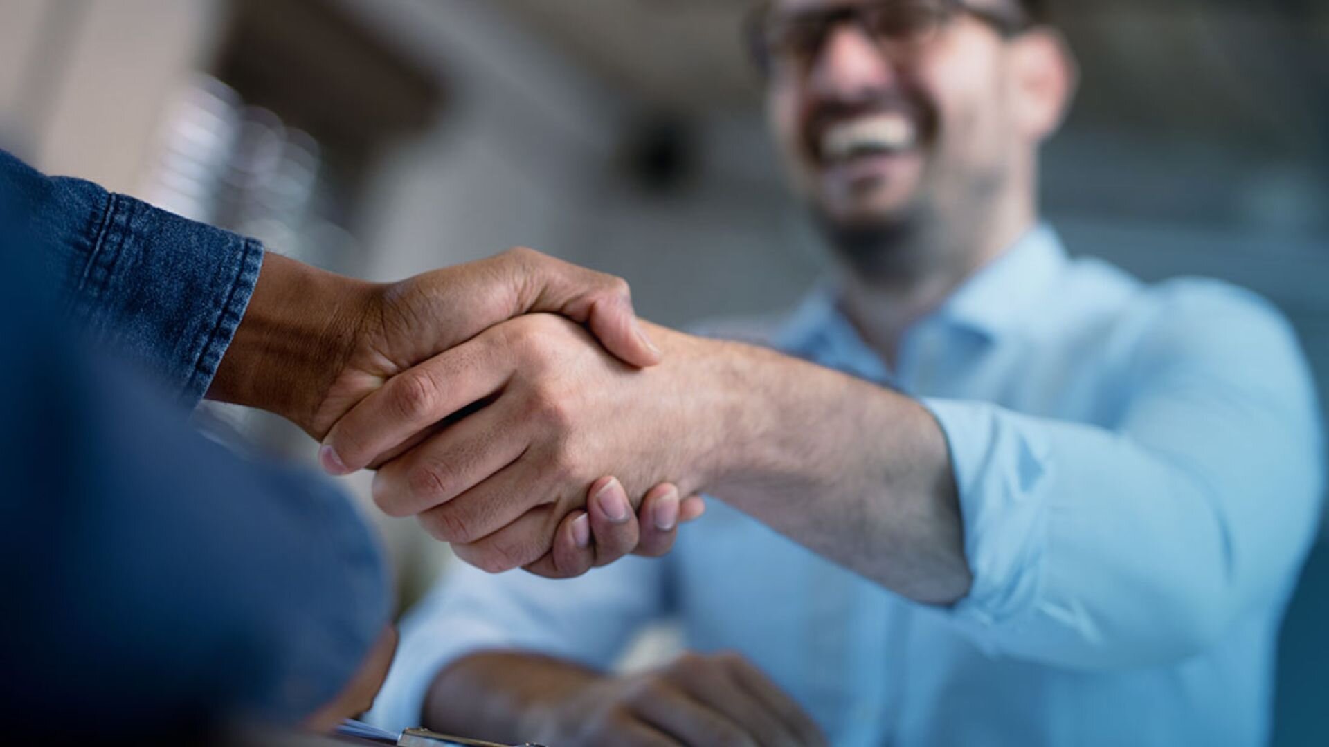 Commercial Clients Shaking Hands Commercial Clients Shaking Hands