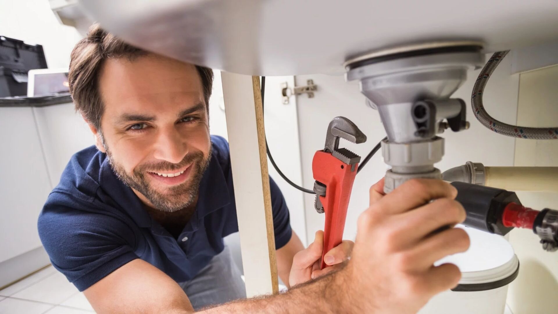 Plumber Maintaining Residential Piping Plumber Maintaining Residential Piping