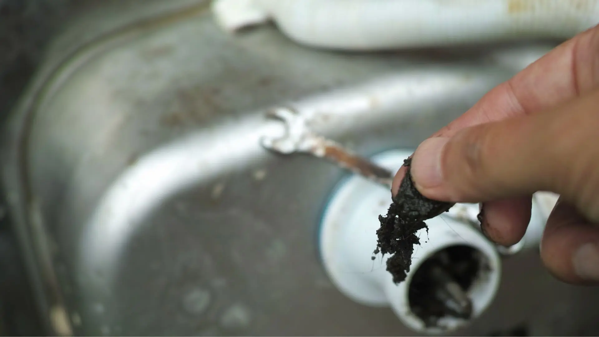 Removing Debris From Blocked Sink Drain Removing Debris Blocked Sink Drain