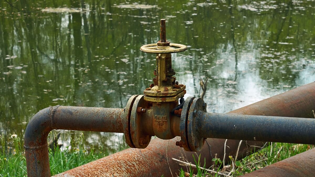 Rusted Outdoor Pipe Near Lake Rusted Outdoor Pipe Lake