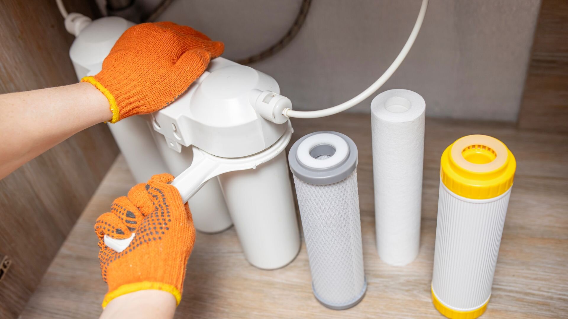 Plumber Installing Under Sink Filter Plumber Installing Sink Filter