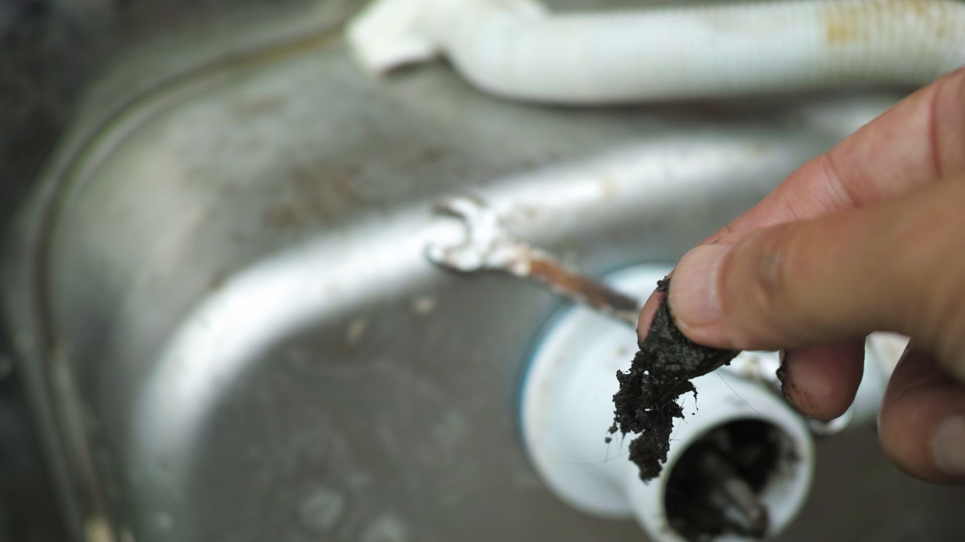 Removing Debris From Sink Removing Debris Sink